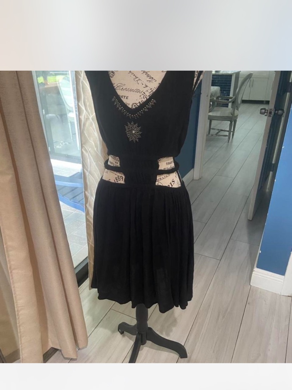 Sleeveless Black Mini Dress with Waist Cutouts